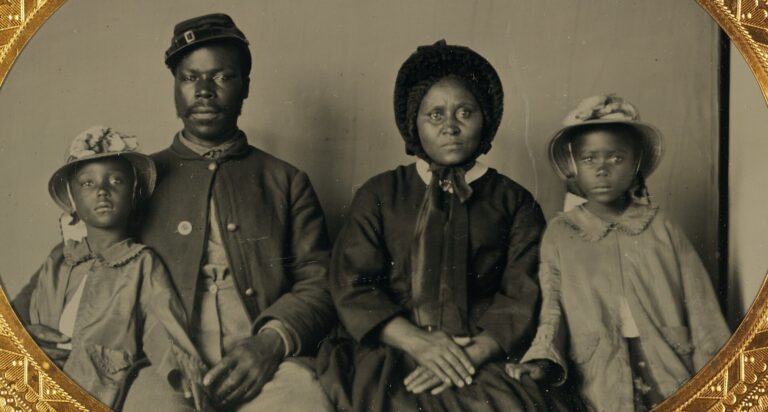 African_American_soldier_in_Union_uniform_with_wife_and_two_daughters_cropped.jpg
