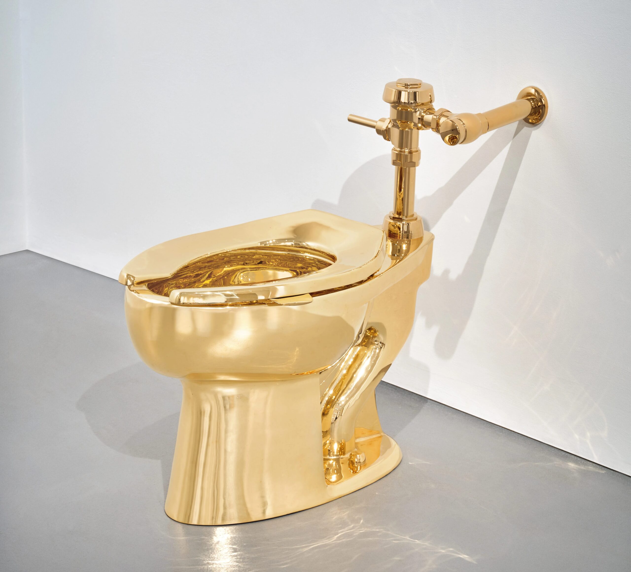 Maurizio-Cattelan-America-2016.-Courtesy-Sothebys-e1761917586481.jpg