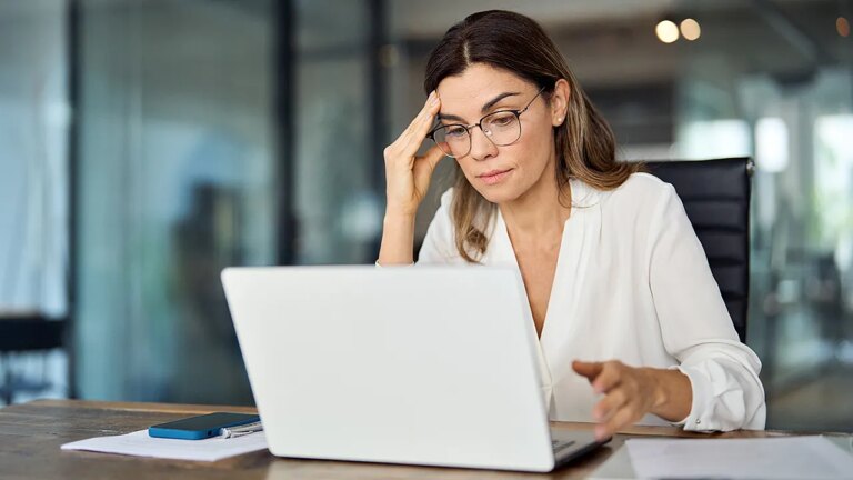 concerned-woman-working-at-laptop-computer.jpg